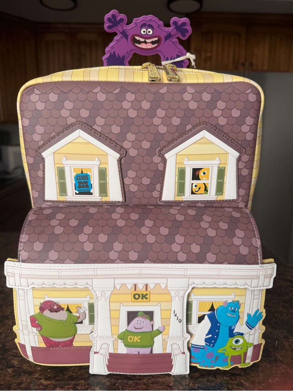 Loungefly Monsters University House Carry Bag in Purple and Yellow